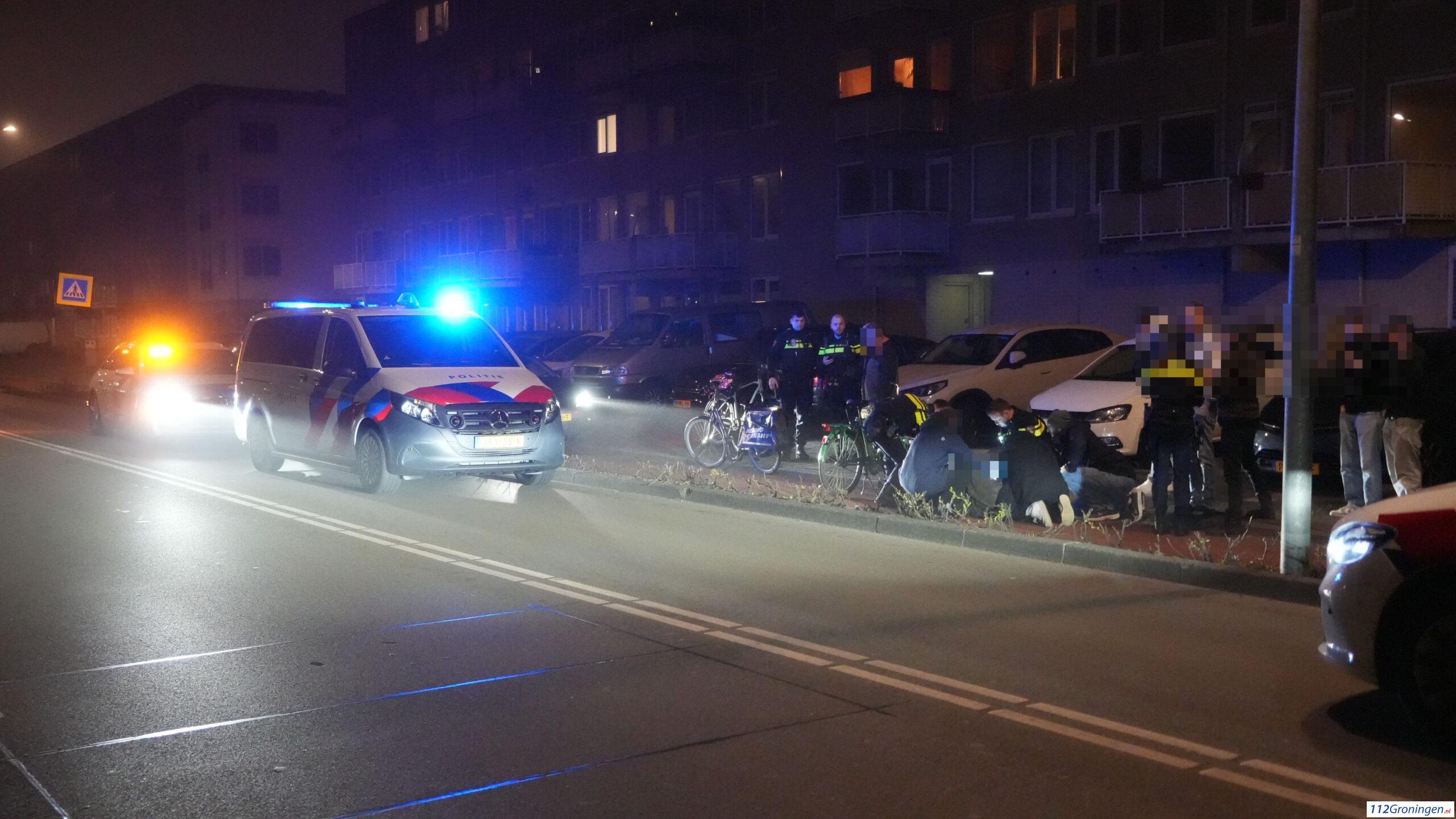 Fietsers ten val op het Damsterdiep