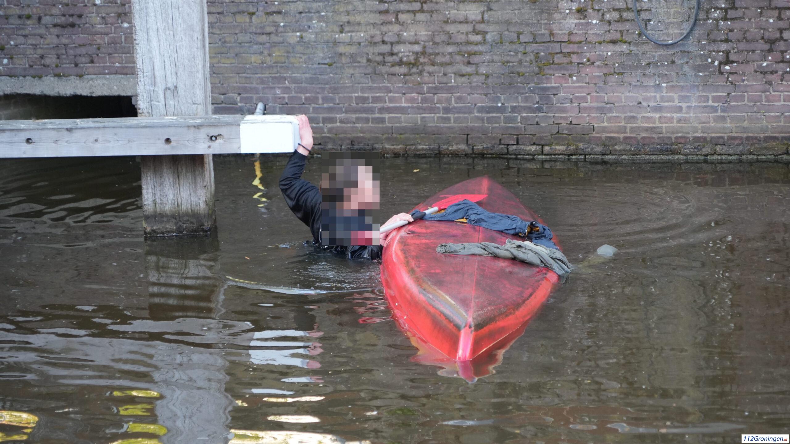 Drie mensen belanden in het koude water van de Lage Der A